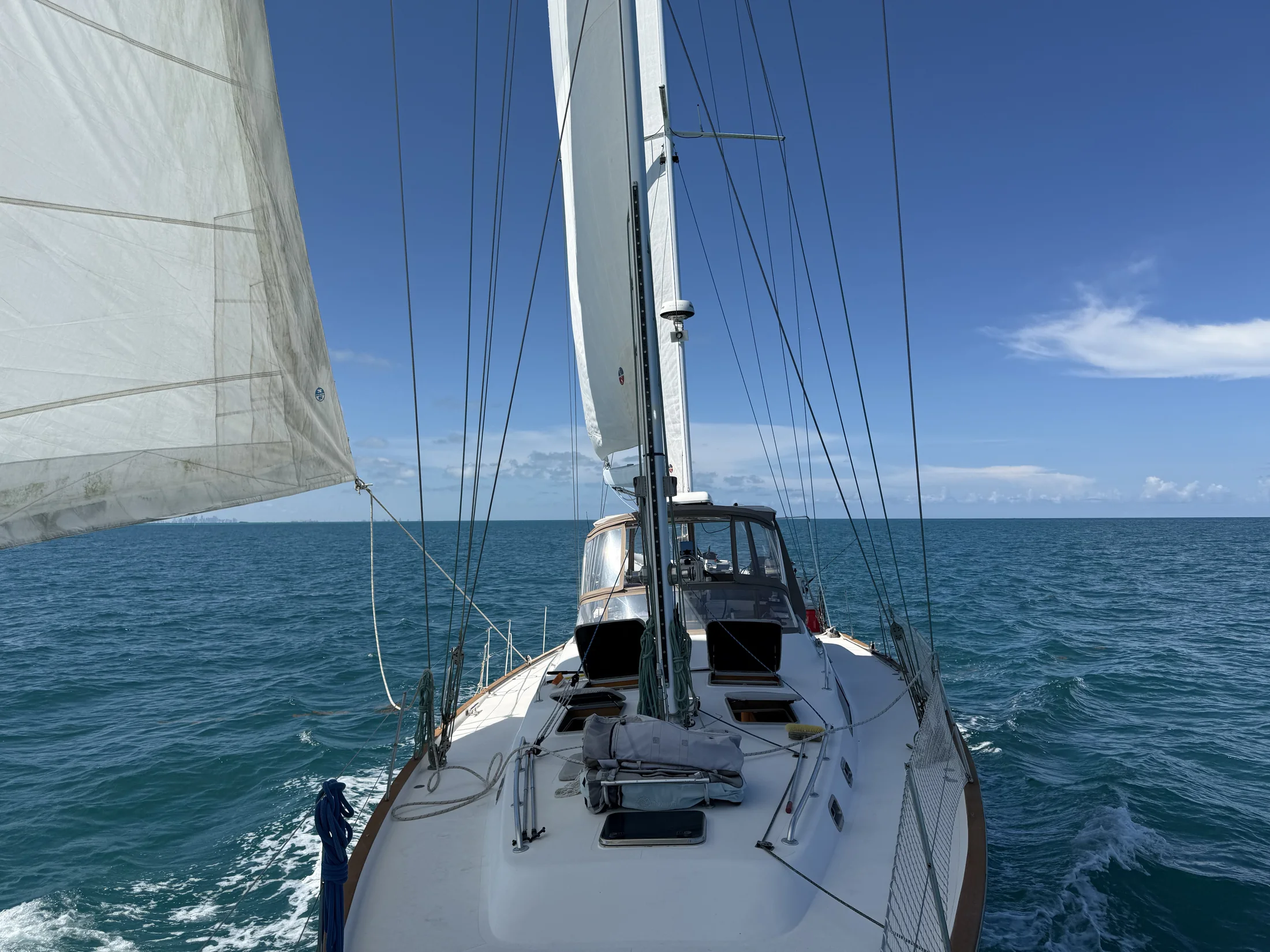 View forward from a sailing yacht underway on open water